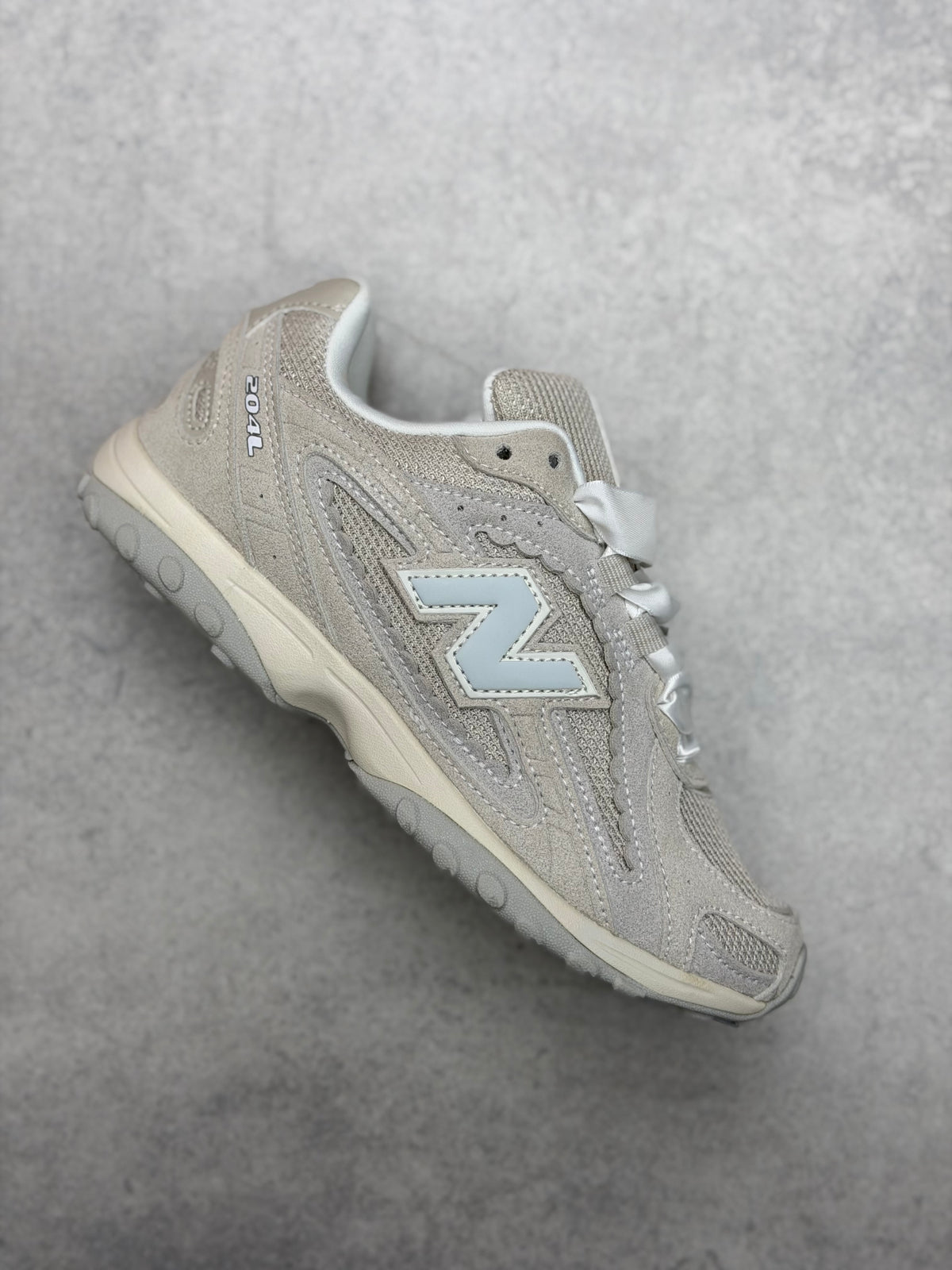 New Balance 204 beige dama